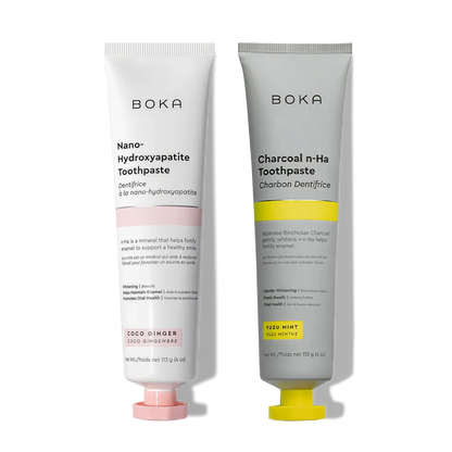 Two n-Ha Toothpaste 2-Pack tubes, designed to remineralize teeth, stand upright.