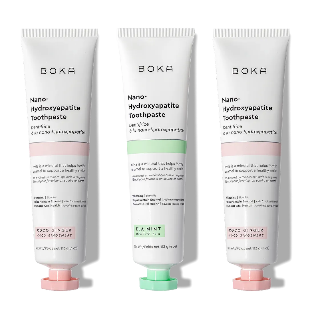 N-Ha Toothpaste 3-Pack in Coco Ginger and Ela Mint flavors, upright for oral care.