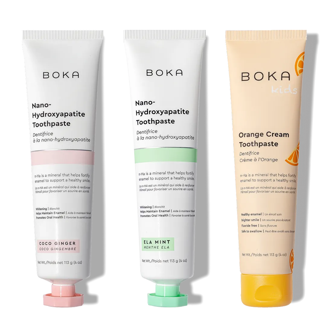The n-Ha Toothpaste 3-Pack—Coco Ginger, Ela Mint & Kids Orange Cream—stands upright for oral care.