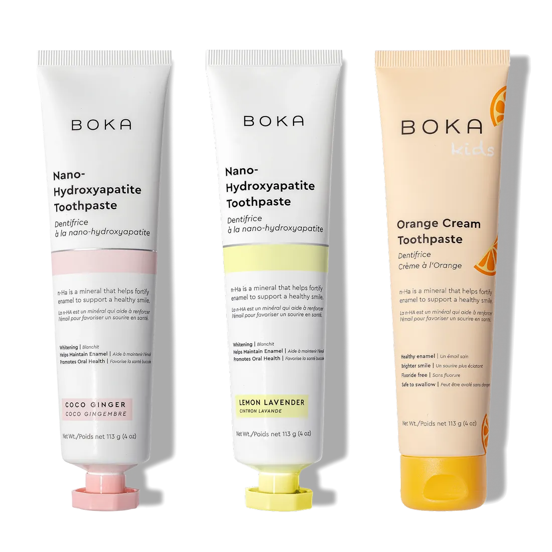 Three n-Ha Toothpaste tubes upright: oral care with nano-hydroxyapatite for all ages.