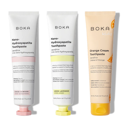 Three n-Ha Toothpaste tubes upright: oral care with nano-hydroxyapatite for all ages.