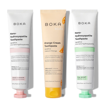 N-Ha Toothpaste 3-Pack: Coco Ginger, Orange Cream, and Ela Mint tubes upright.