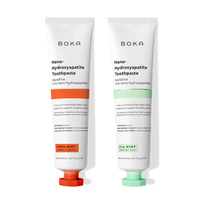 Two n-Ha Toothpaste 2-Packs side by side, made to fortify enamel with nano-hydroxyapatite.