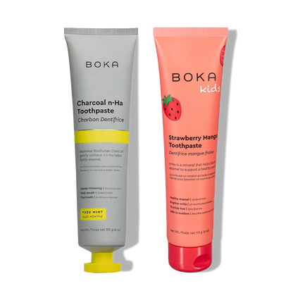 Two upright n-Ha Toothpaste tubes feature nano-hydroxyapatite to strengthen enamel.