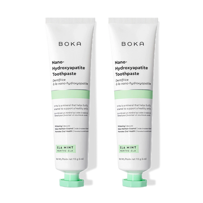 Two tubes of n-Ha Toothpaste 2-Pack to remineralize teeth, shown on a black background.
