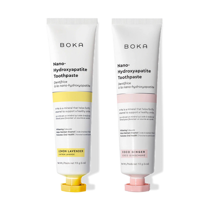 Two n-Ha Toothpaste 2-Pack tubes stand upright, crafted to strengthen and remineralize enamel.