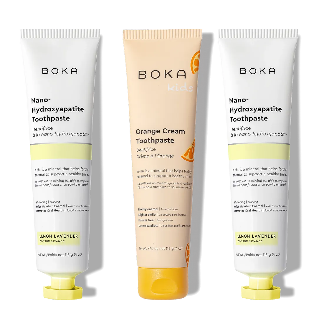 Three upright tubes of n-Ha Toothpaste 3-Pack with nano-hydroxyapatite for better oral care.
