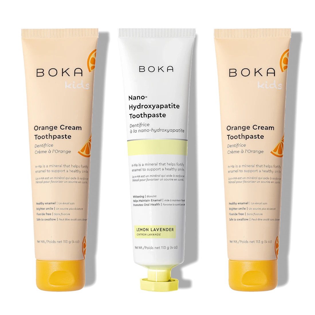 N-Ha Toothpaste 3-Pack: 2 Orange Cream tubes and 1 Lemon Lavender tube in the center.