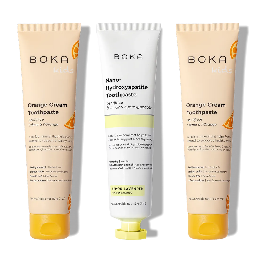 N-Ha Toothpaste Family 3 Pack: two Orange Cream (kids) and one Lemon Lavender nano-hydroxyapatite.
