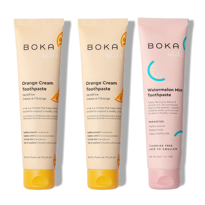 N-Ha Toothpaste Family 3 Pack: three kid-friendly tubes for healthy brushing, all standing upright.
